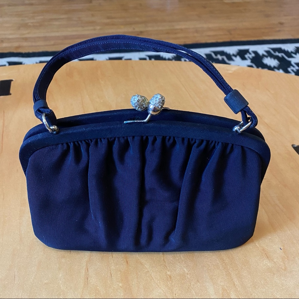 Navy purse with crystal acorn clasp